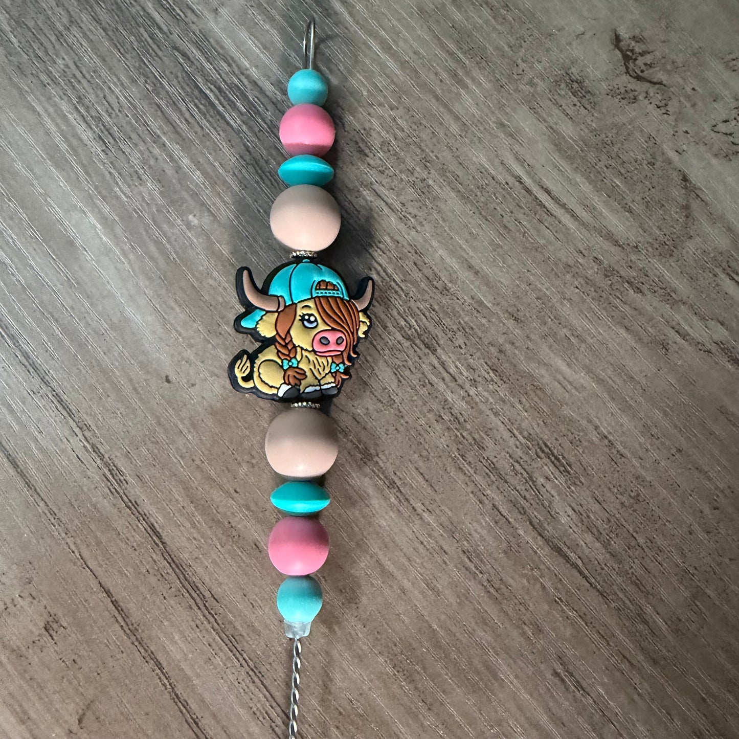 Beaded straw cleaner