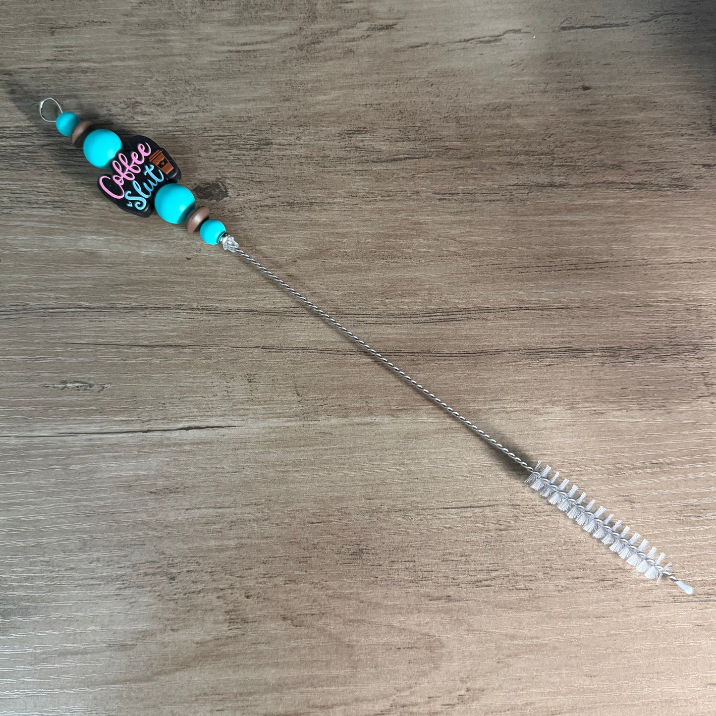 Beaded straw cleaner