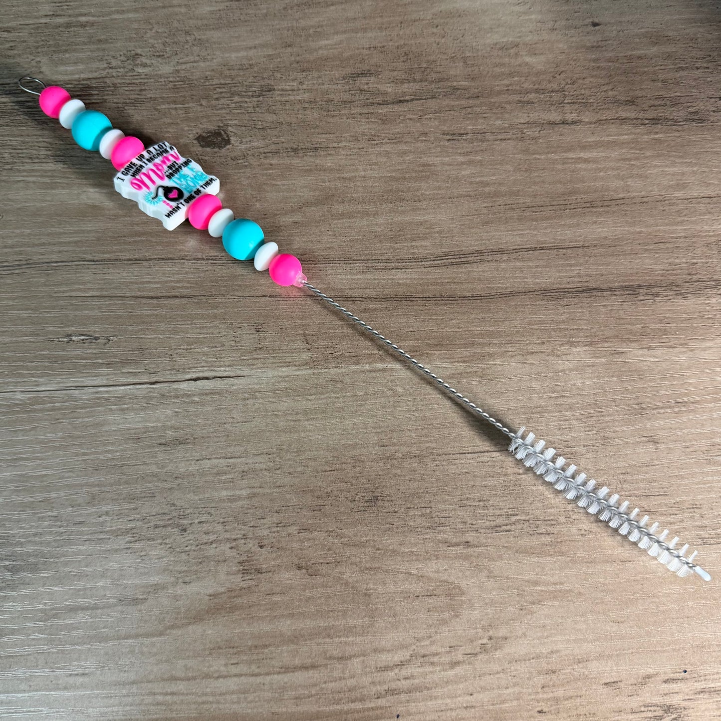 Beaded straw cleaner