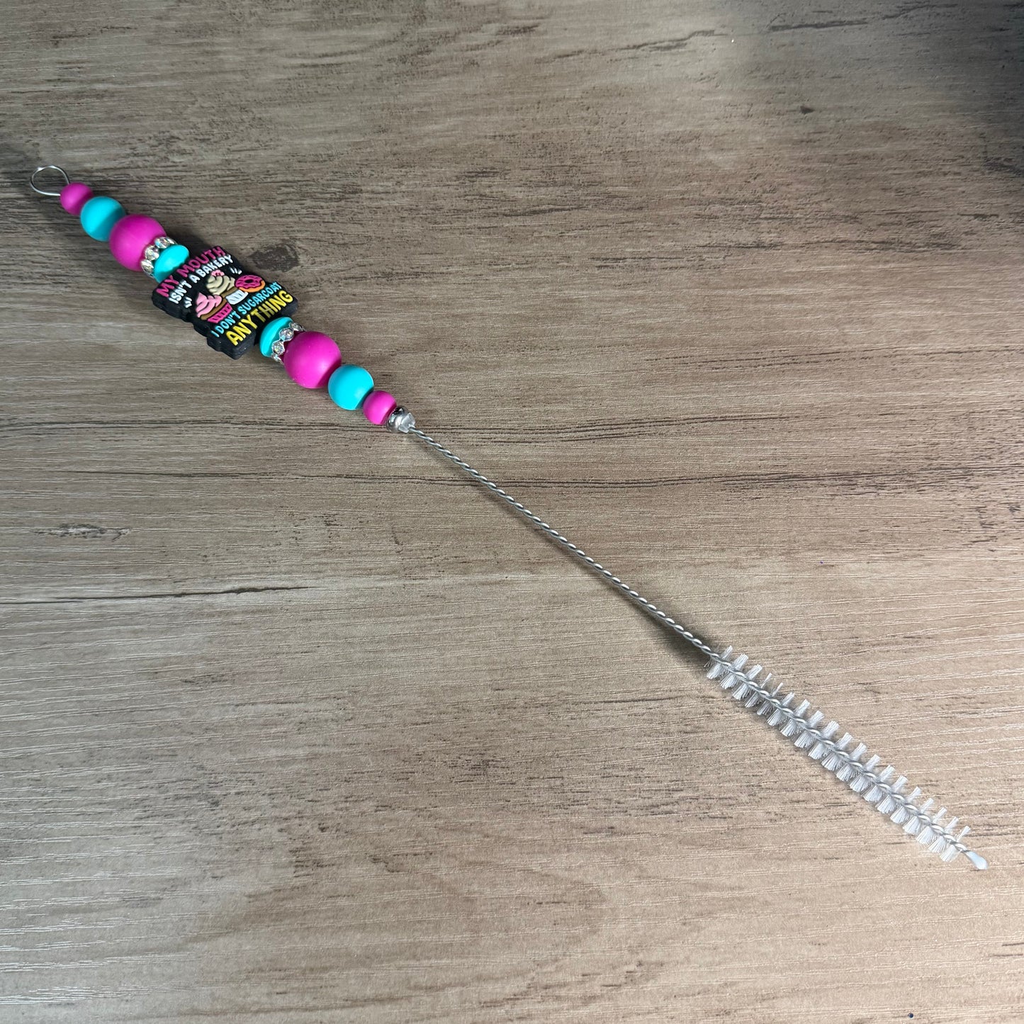 Beaded straw cleaner