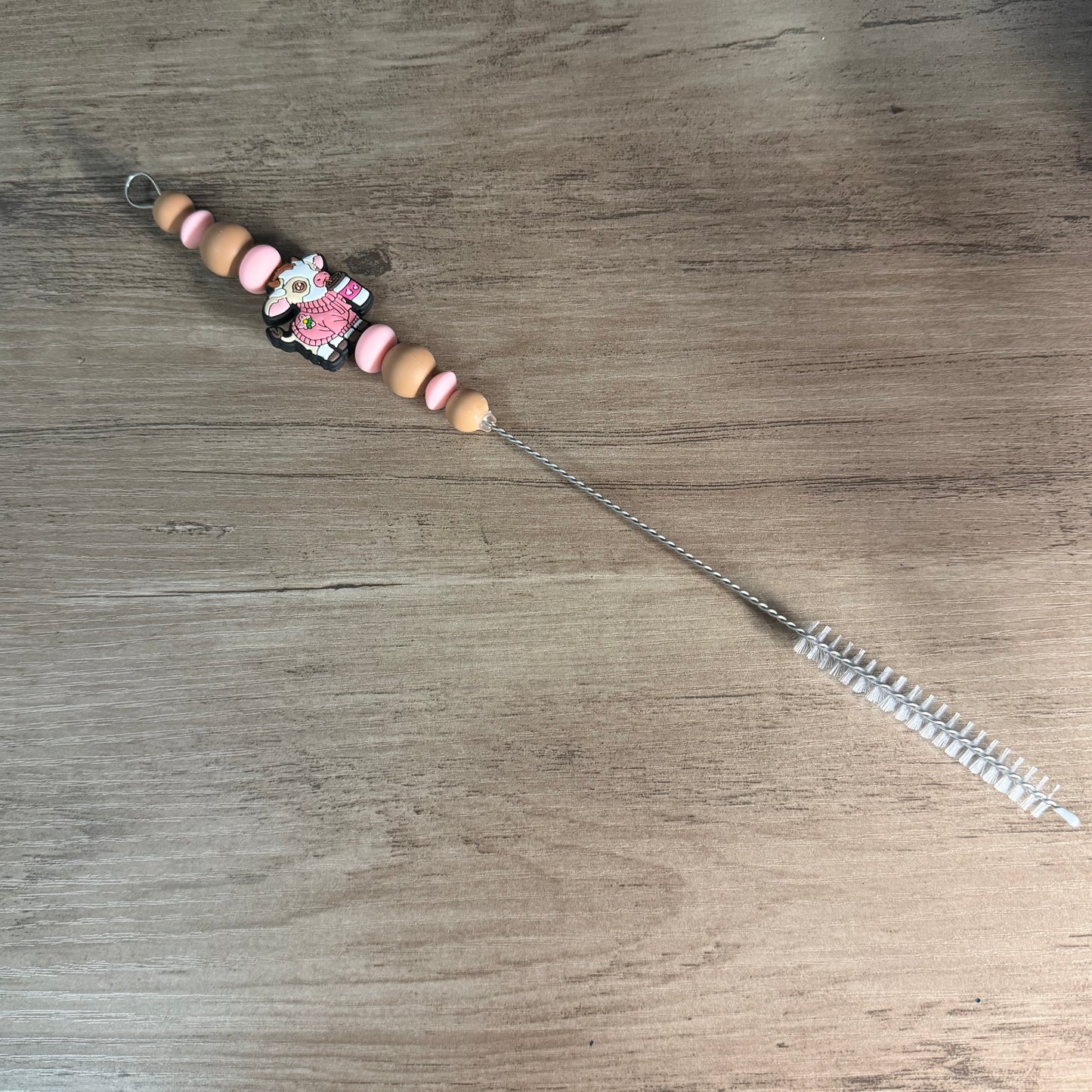 Beaded straw cleaner