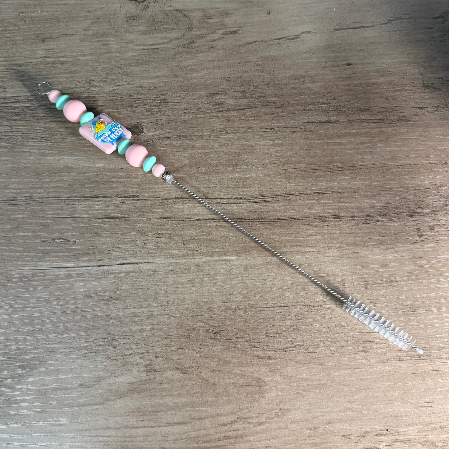 Beaded straw cleaner