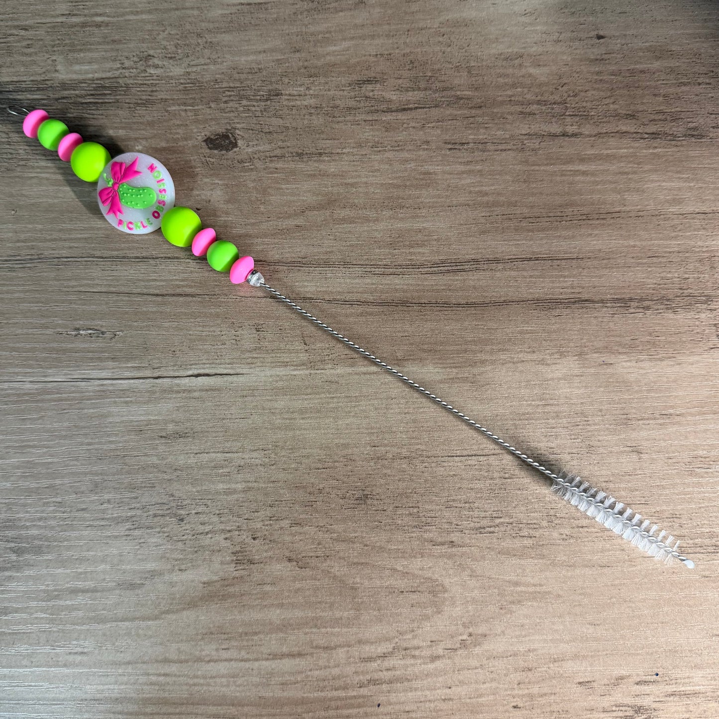 Beaded straw cleaner